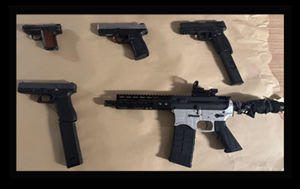"ghost gun" assault rifle and four pistols